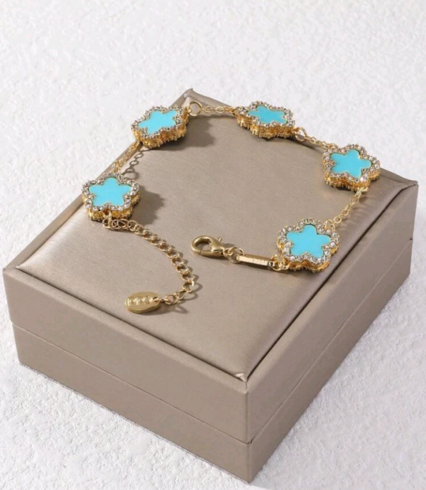 Pulseira em aço com flores turquesa